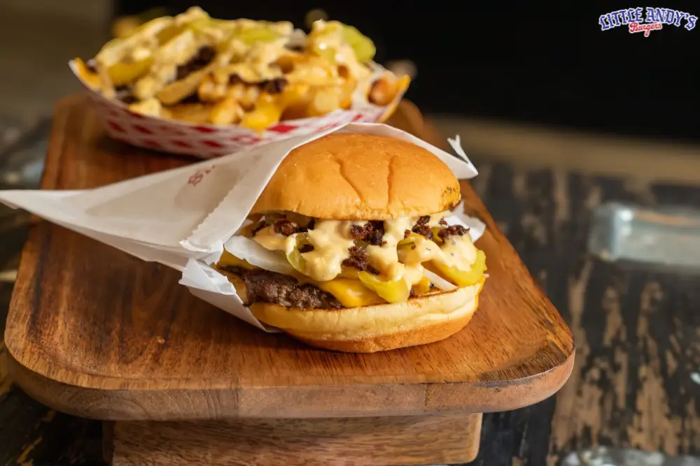 What is a smash burger: a double smash burger with crispy seared edges, melted American cheese, pickles, grilled onions and burger sauce on a toasted potato bun, served with loaded cheese fries.